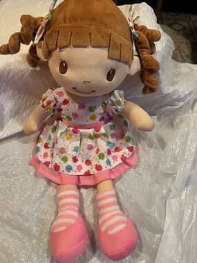 Plush Brown-Haired Doll with Pink Dress and Striped Socks